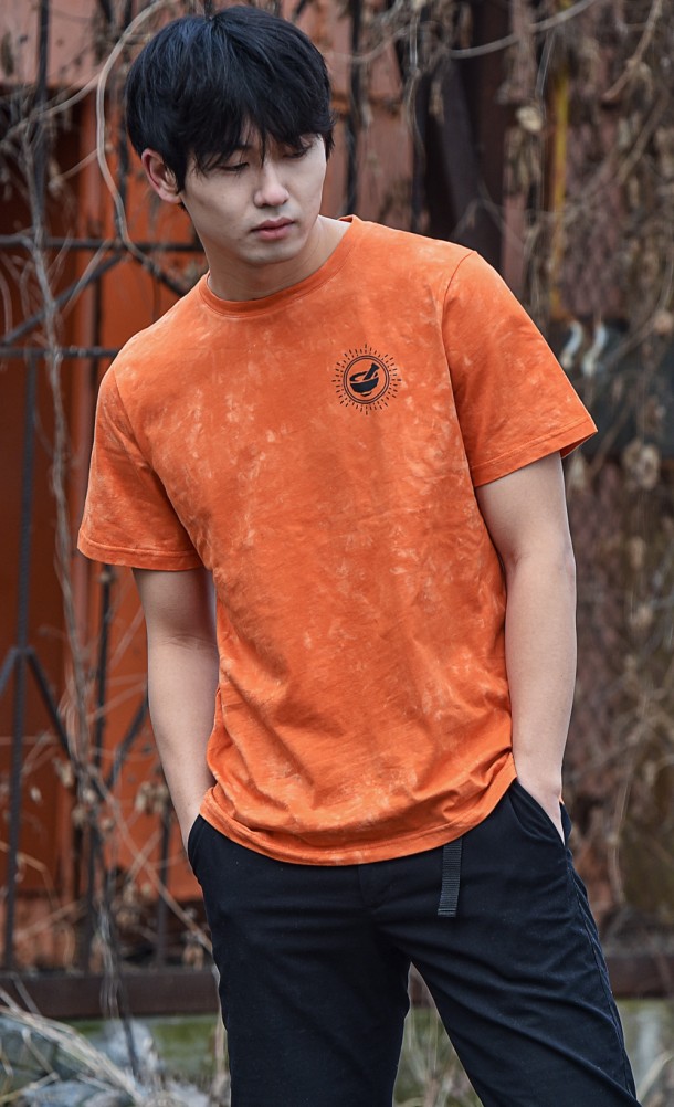 Model wearing the Dye Merchants t-shirt from our Horizon Forbidden West collection