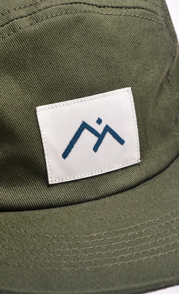 Close up detail on the front print of the Call of the Mountain cap from our Horizon Call of the Mountain collection