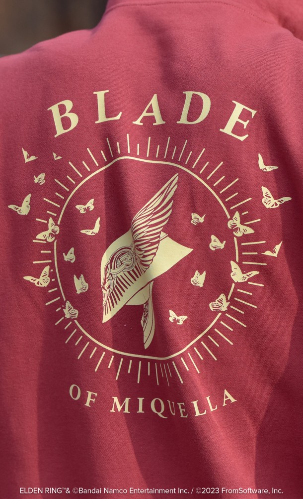 Close up detail on the back print of the Blade of Miquella hoodie from our Elden Ring collection