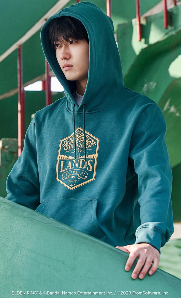 Model is wearing the Lands Between Hoodie from our Elden Ring collection