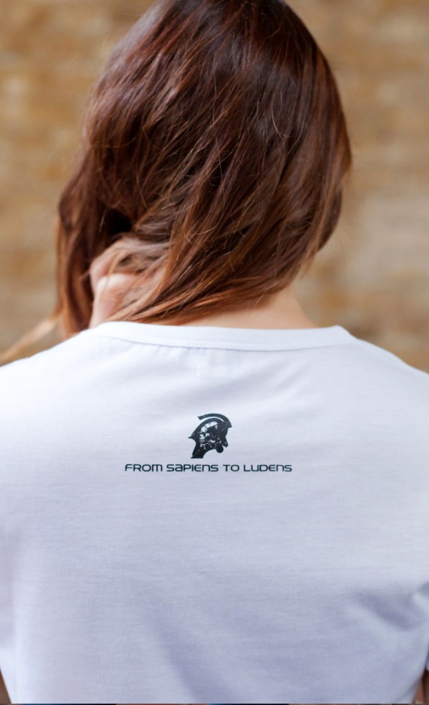 Model wearing the KojiPro white T-Shirt from our Kojima Productions collection