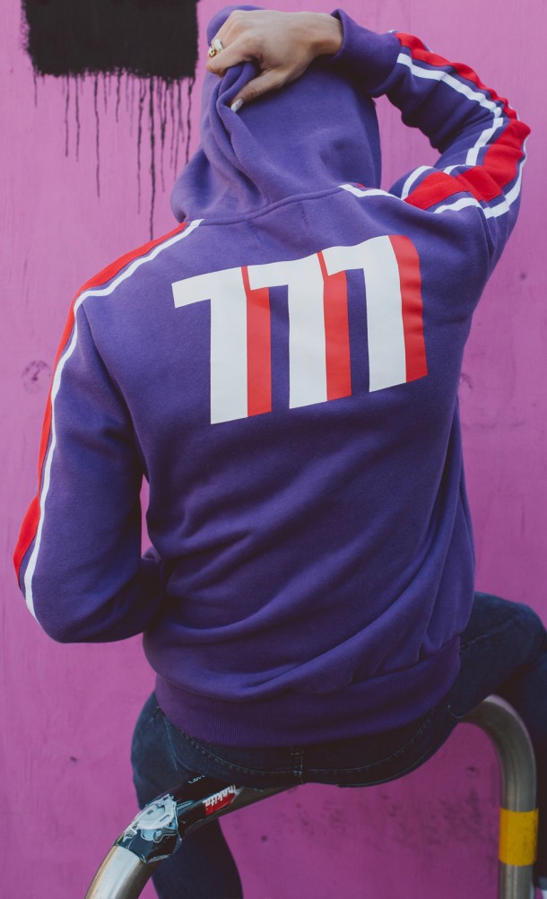 Model wearing the Ryuji 777 hoodie from our Persona 5 collection